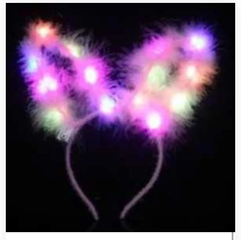 Features soft, fuzzy fur trim shaped into bunny ears with integrated multicolor LED lights that glow brightly in the dark.